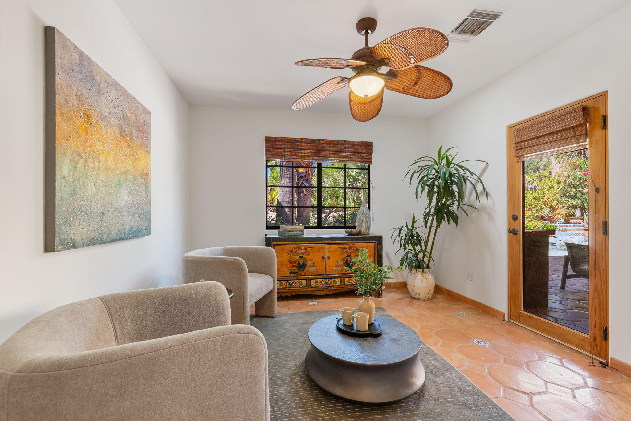 71429 Mirage Road Rancho Mirage, CA 92270 - Photo 39 of 65 a living room with furniture and a large window