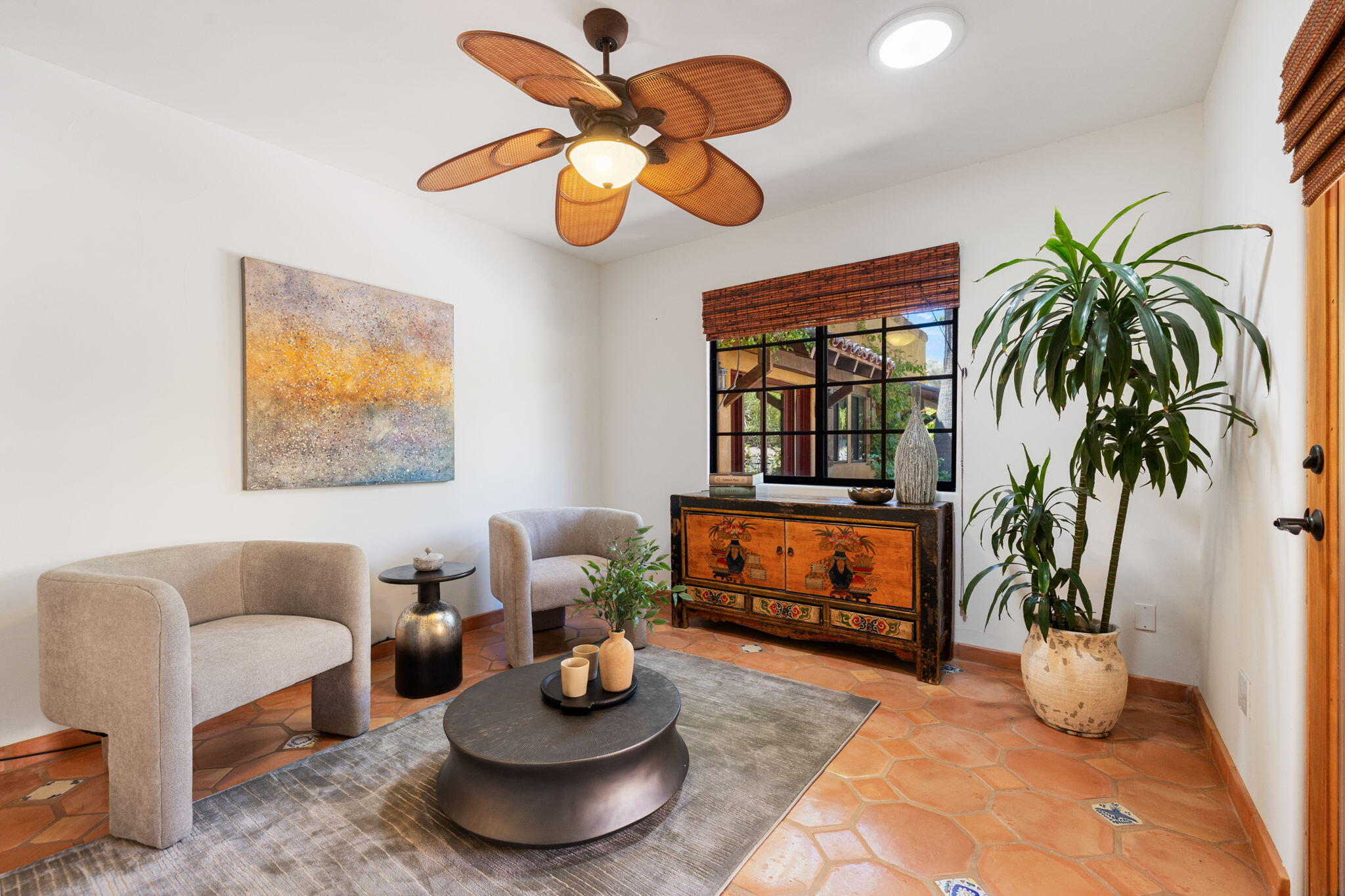 71429 Mirage Road Rancho Mirage, CA 92270 - Photo 41 of 65 a living room with furniture potted plant and a fireplace
