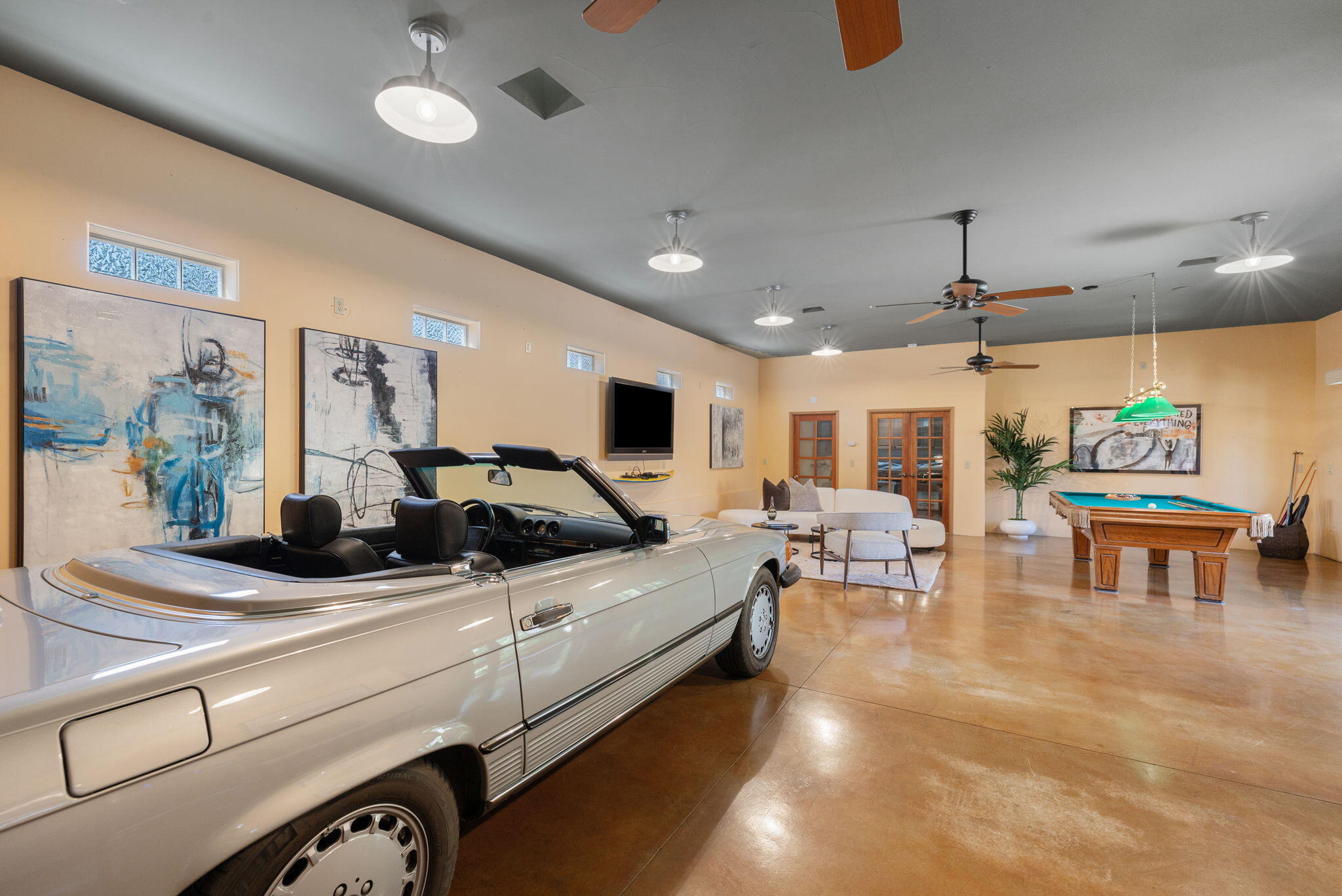 71429 Mirage Road Rancho Mirage, CA 92270 - Photo 45 of 65 a living room with furniture and a flat screen tv