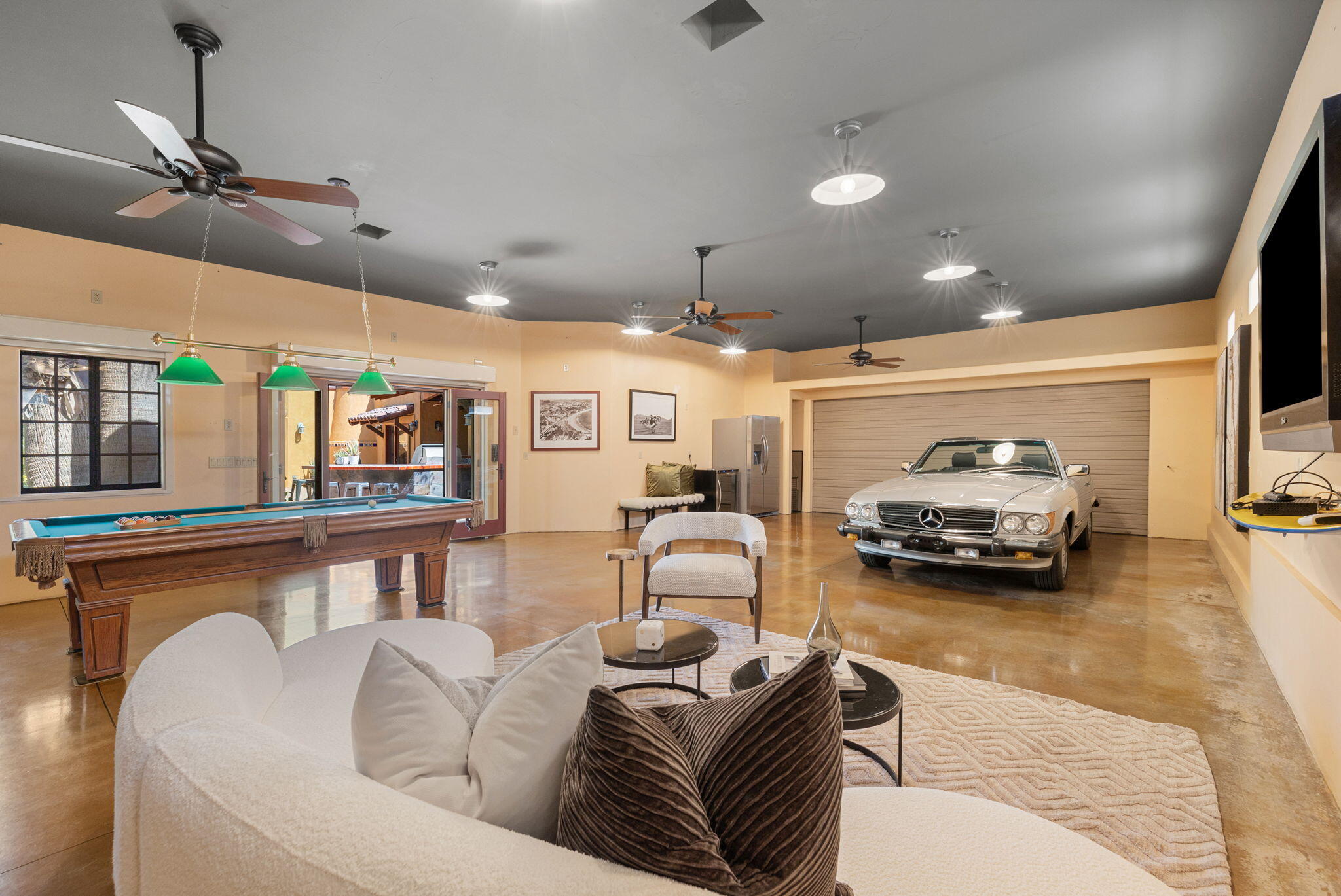 71429 Mirage Road Rancho Mirage, CA 92270 - Photo 47 of 65 a living room with furniture and a flat screen tv