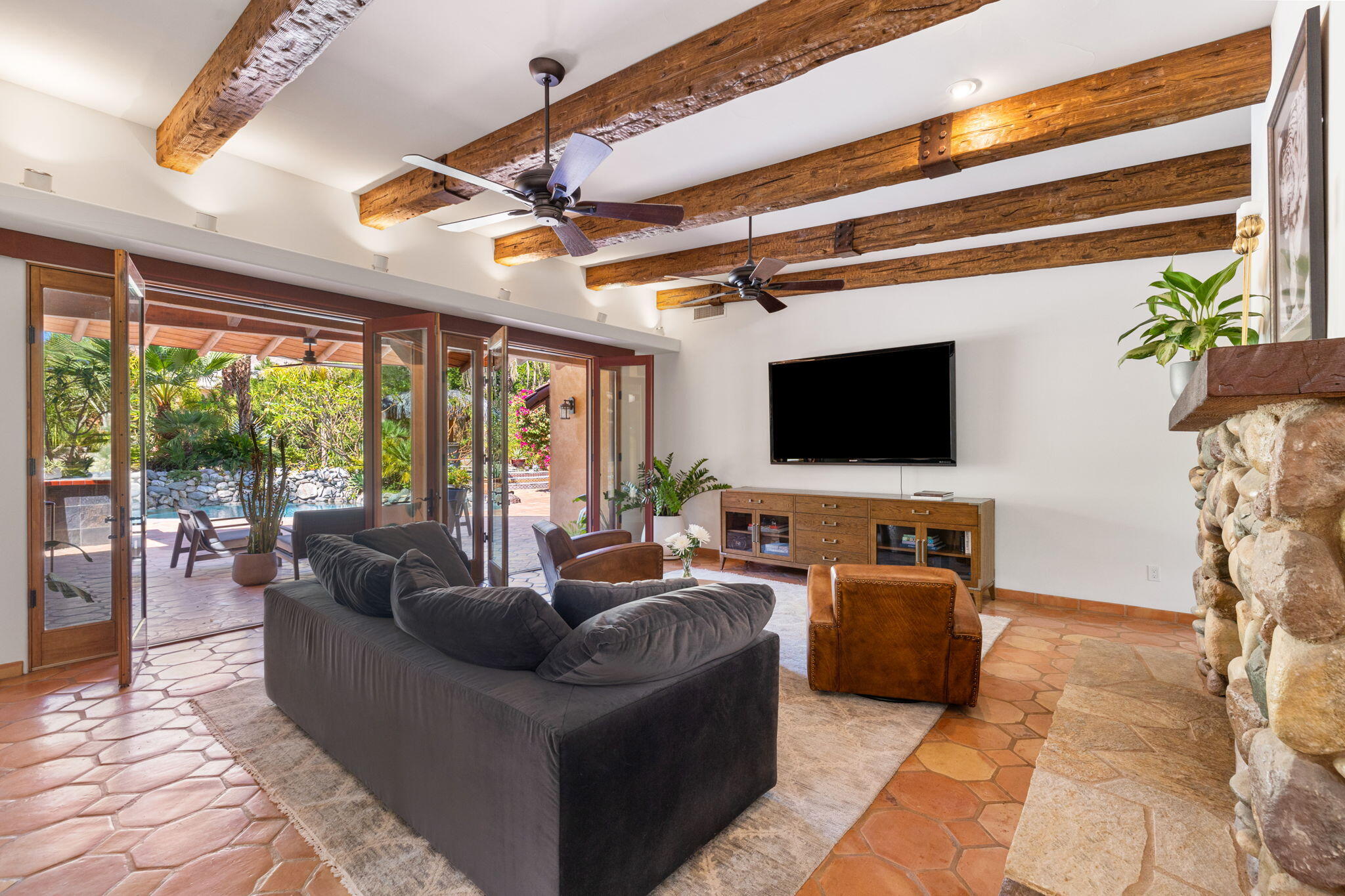 71429 Mirage Road Rancho Mirage, CA 92270 - Photo 51 of 65 a living room with furniture and a flat screen tv
