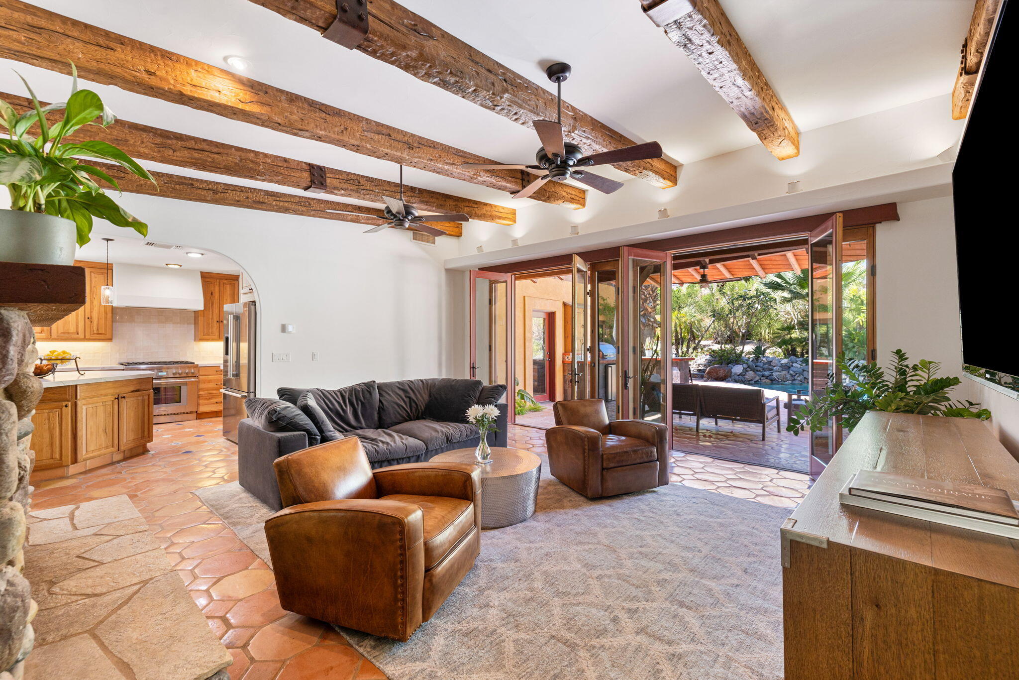 71429 Mirage Road Rancho Mirage, CA 92270 - Photo 52 of 65 a living room with furniture and a large window