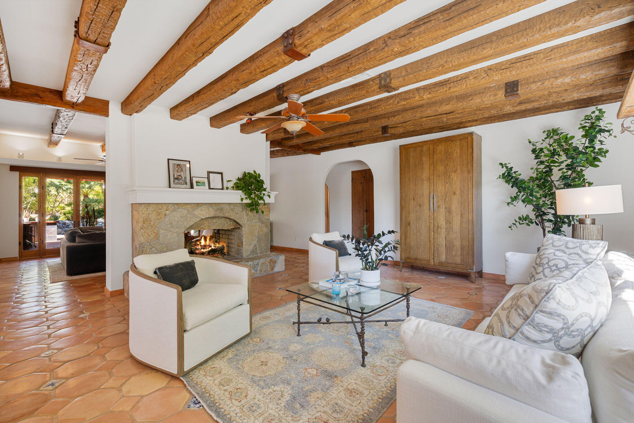 71429 Mirage Road Rancho Mirage, CA 92270 - Photo 56 of 65 a living room with furniture and a chandelier