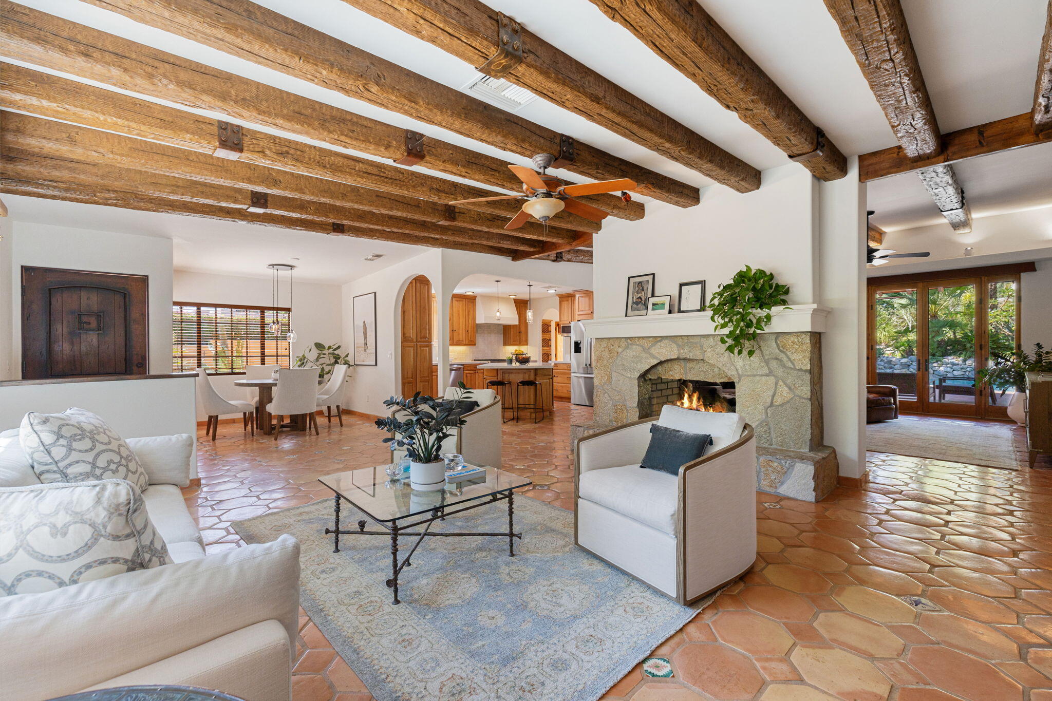 71429 Mirage Road Rancho Mirage, CA 92270 - Photo 57 of 65 a living room with furniture and a fireplace