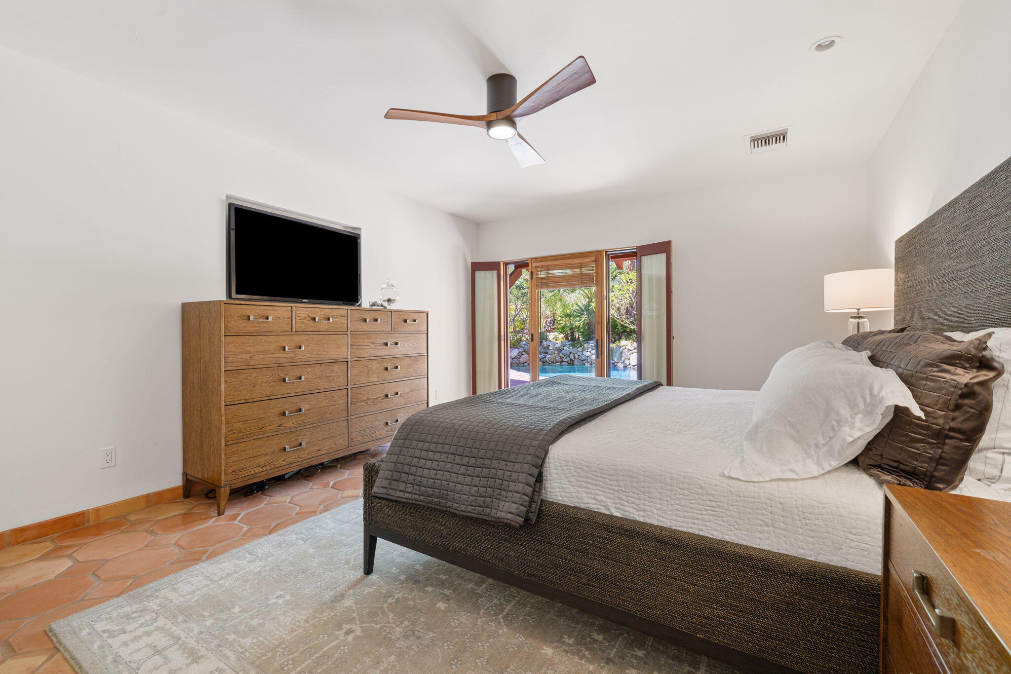 71429 Mirage Road Rancho Mirage, CA 92270 - Photo 61 of 65 a bedroom with a bed and a television