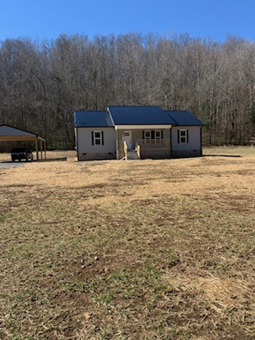 2302 Dry Prong Road Mulberry, TN 37359 - Photo 1 of 10 a house with yard in front of it
