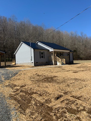 2302 Dry Prong Road Mulberry, TN 37359 - Photo 2 of 10 a view of house with backyard and tree