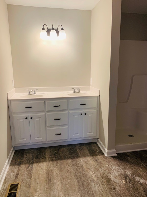 2302 Dry Prong Road Mulberry, TN 37359 - Photo 5 of 10 a bathroom with a sink and a mirror