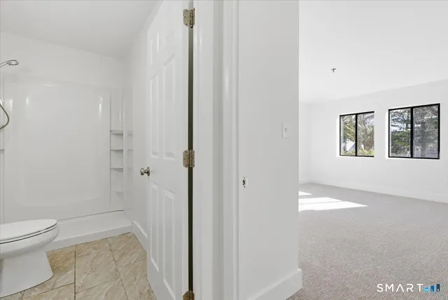 a bathroom with a toilet