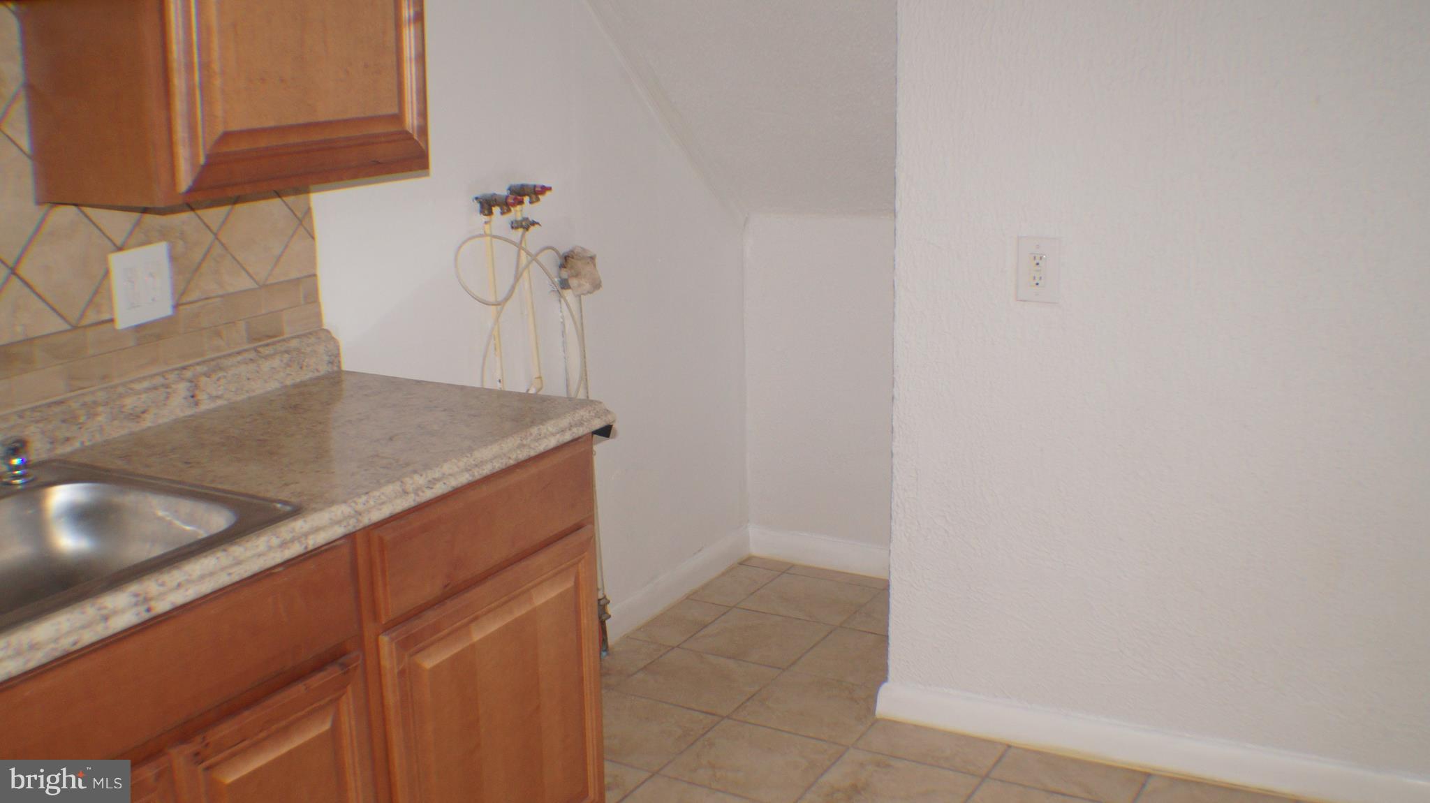 714 Columbus Court Wallingford, PA 19086 - Photo 3 of 8 Kitchen-2 & Laundry Hook Up's