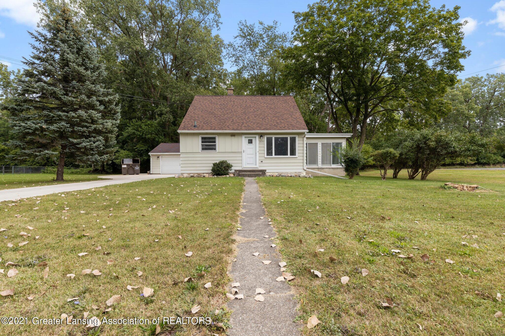 3121 Pleasant Grove Road Lansing, MI 48910 - Photo 3 of 29 Front