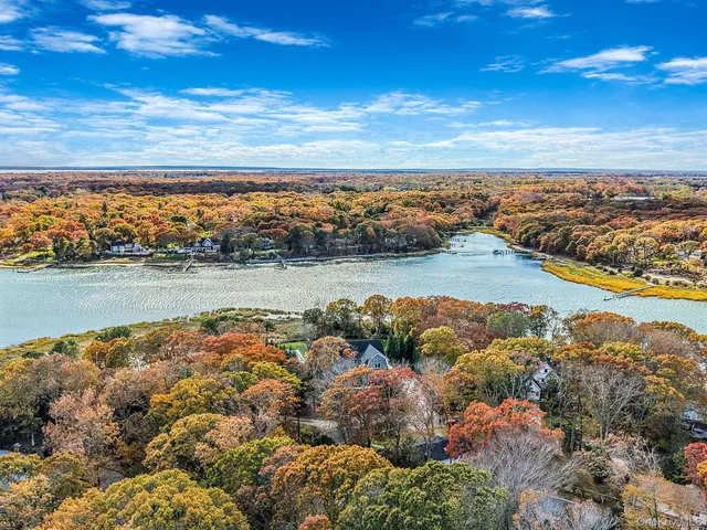 a view of an ocean and city