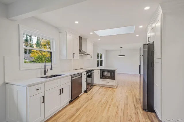 a view of livingroom with furniture and wooden floor