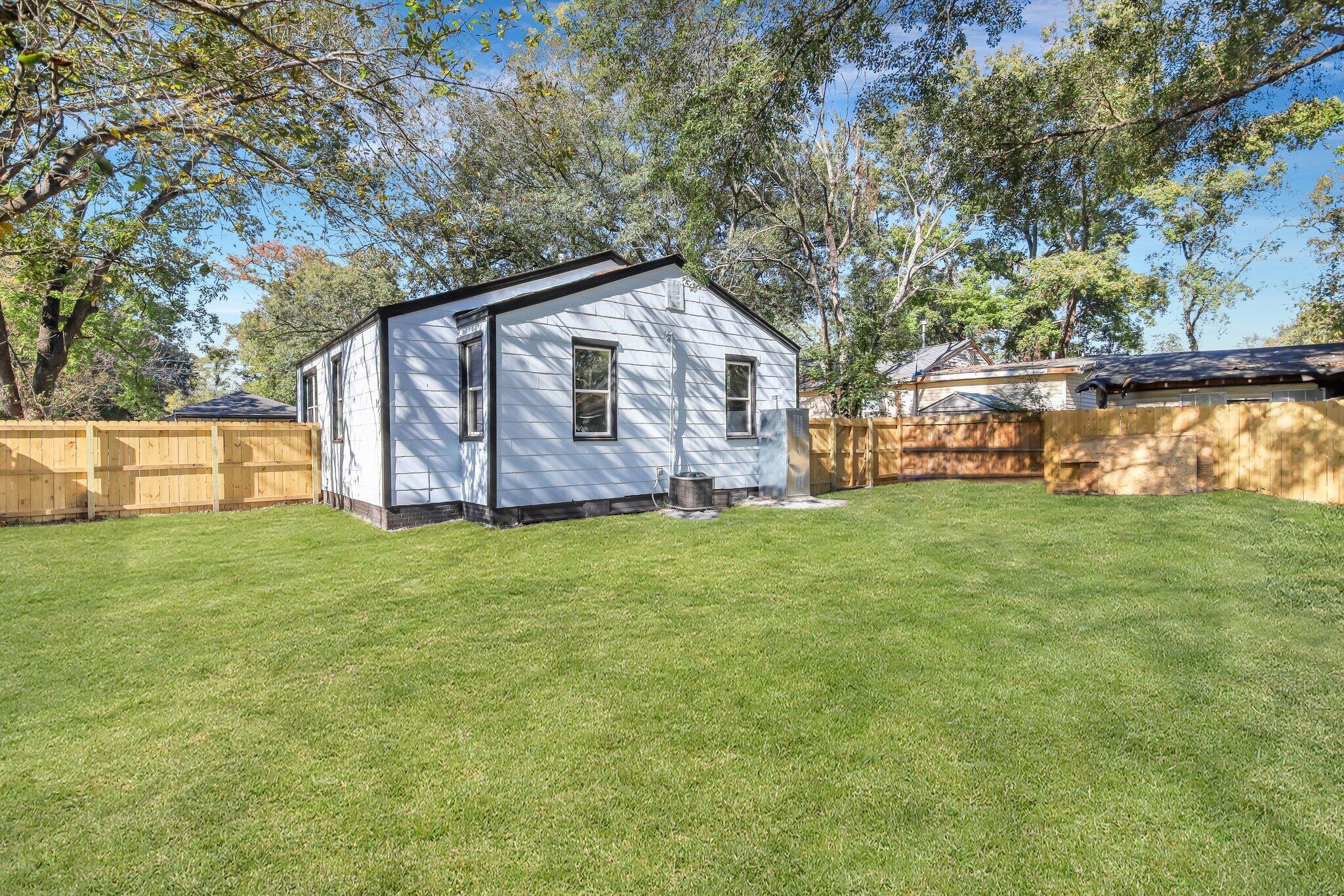 2697 Ranger Drive North Charleston, SC 29405 - Photo 22 of 24 Rear view with enhanced grass