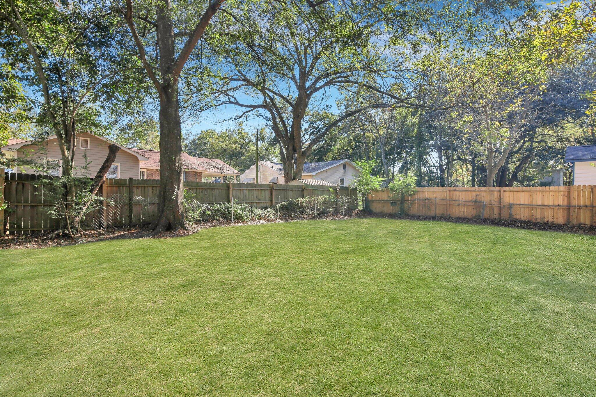 2697 Ranger Drive North Charleston, SC 29405 - Photo 23 of 24 Backyard with Enahnce grass