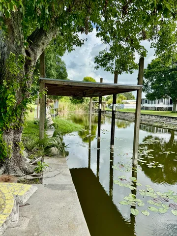 a view of swimming pool from a balcony