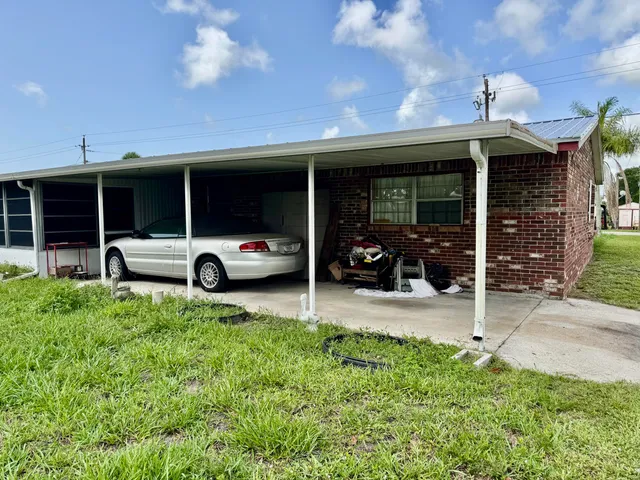 a car parked in front of the house