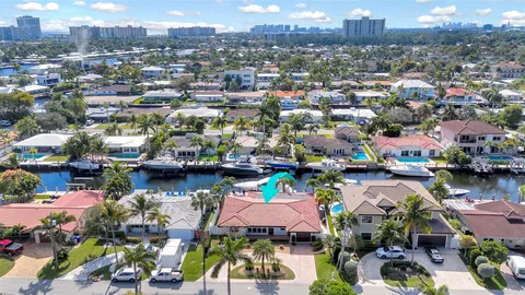 an aerial view of a city with lots of residential buildings