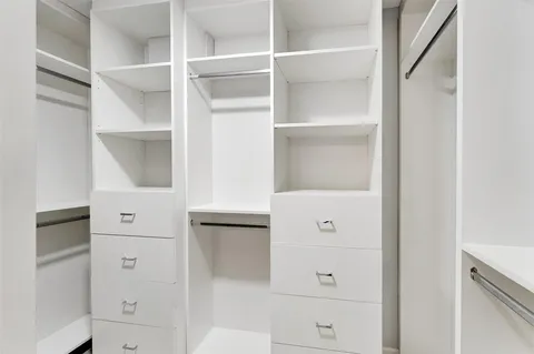 a bathroom with a shower and a toilet