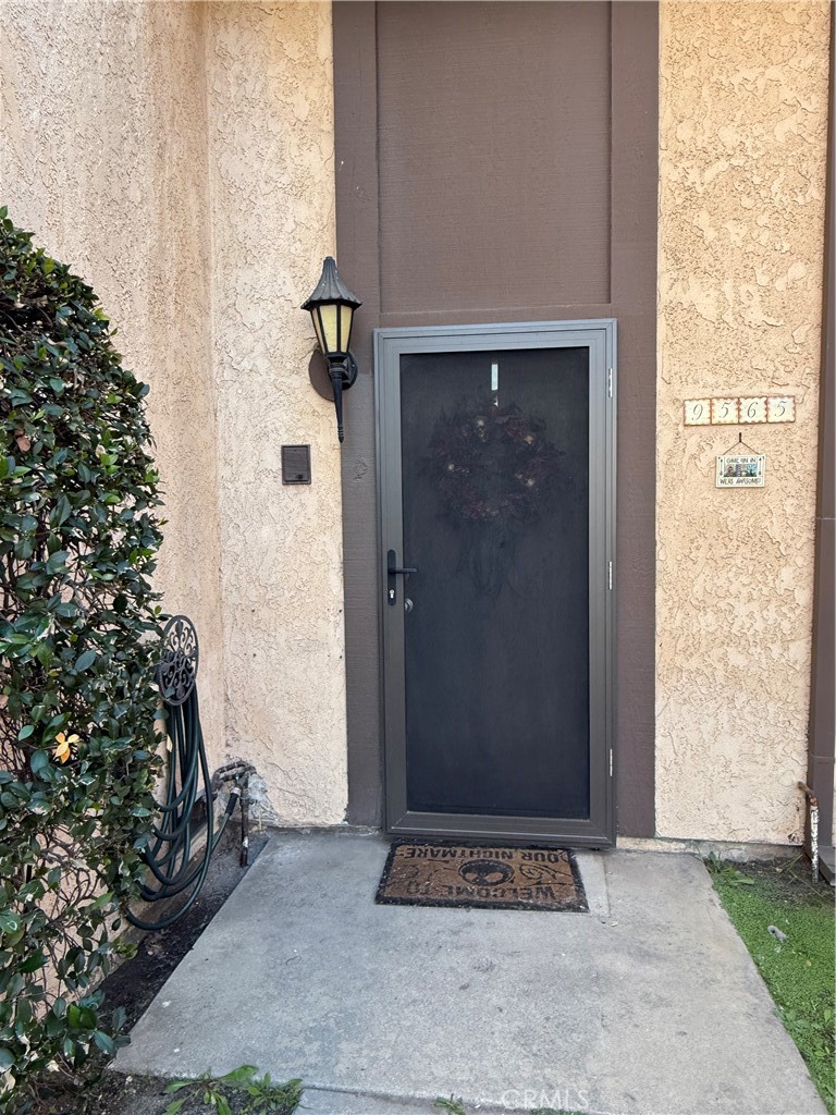9565 Graham Street Cypress, CA 90630 - Photo 25 of 29 an empty room with windows