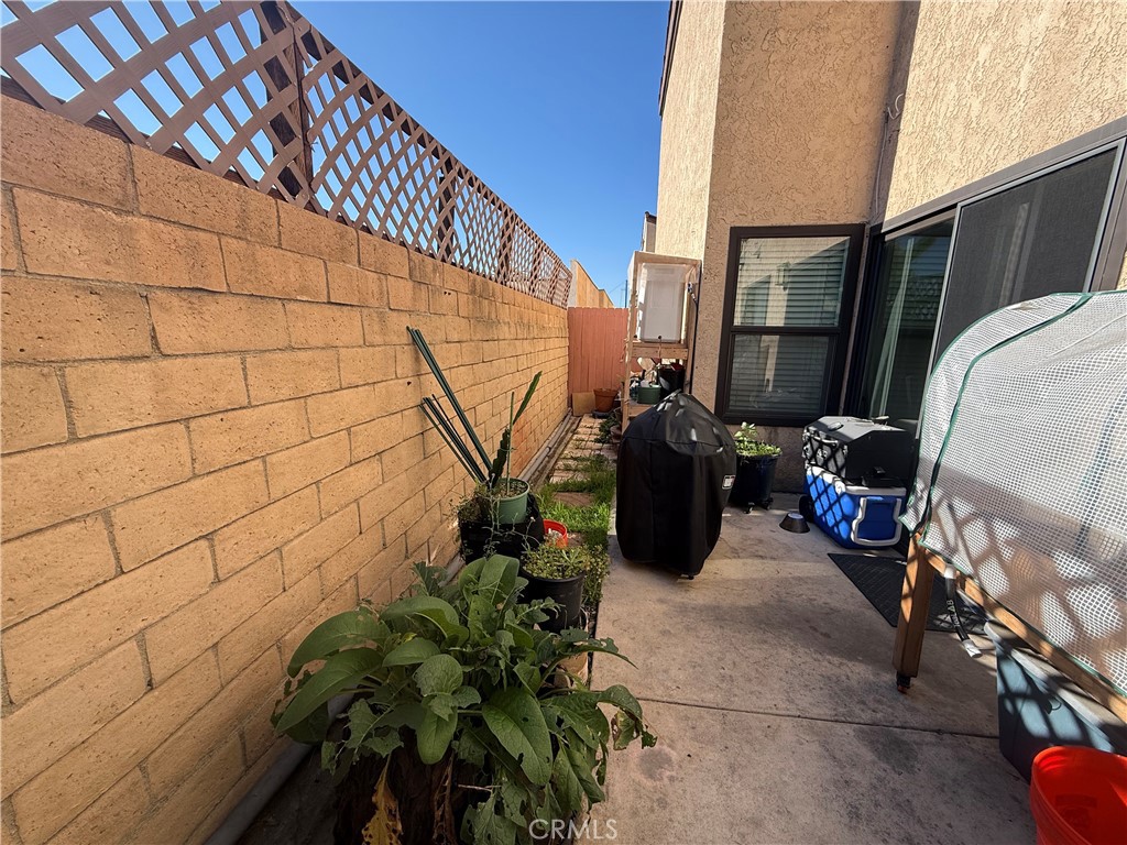 9565 Graham Street Cypress, CA 90630 - Photo 28 of 29 a backyard of a house with seating space