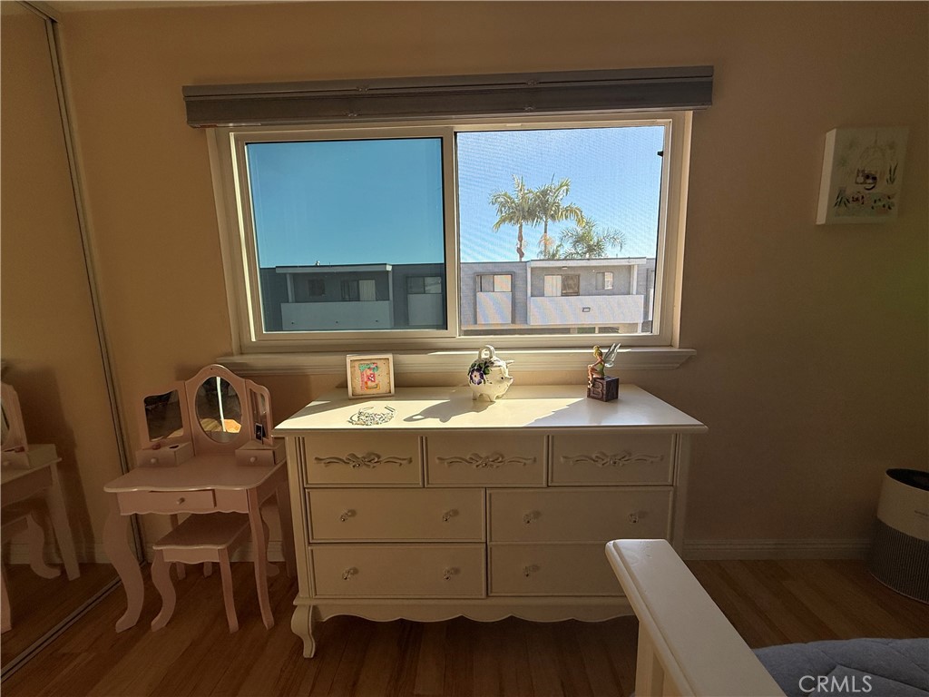 9565 Graham Street Cypress, CA 90630 - Photo 4 of 29 a bathroom with a sink mirror and a window