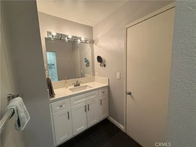 a bathroom with a toilet and shower