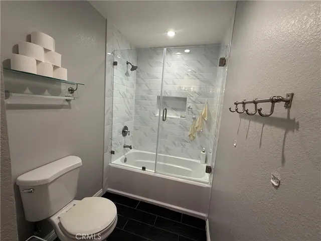 a bathroom with a sink vanity and mirror