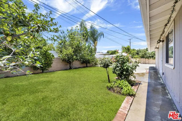 a view of a garden with pathway