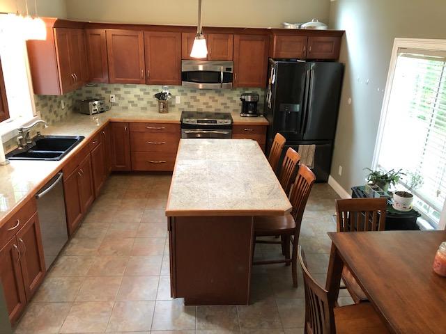 22 Stiles Avenue Springvale, ME 04083 - Photo 12 of 18 Kitchen w/ breakfast bar/island