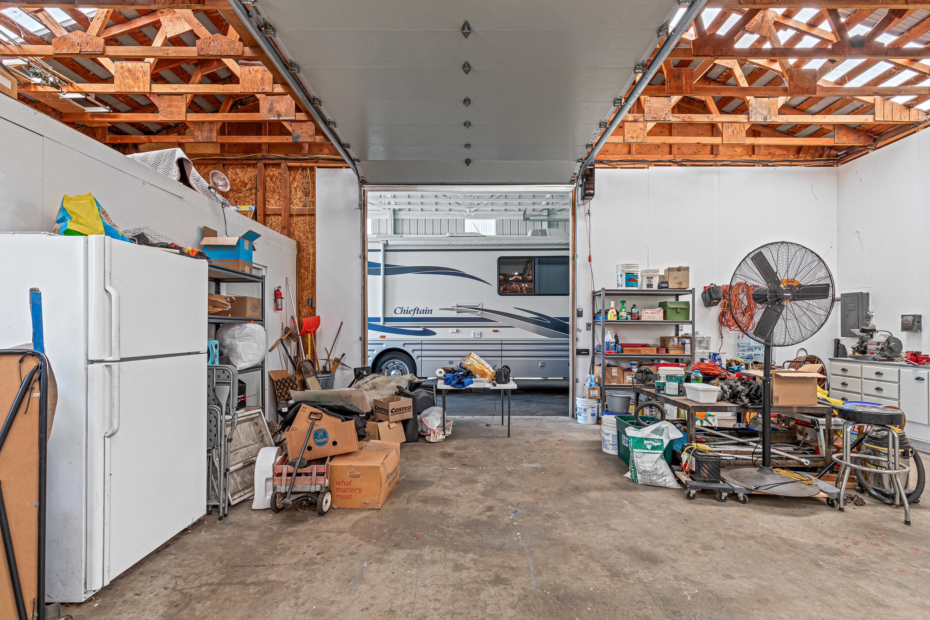3821 Hilsinger Road Phoenix, OR 97535 - Photo 35 of 47 Workshop looking toward Roll-up door to RV Garage. Storage Room/office on left