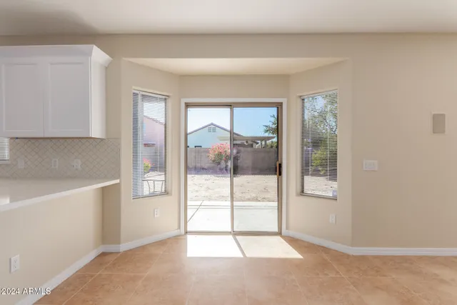 a large kitchen with cabinets