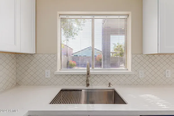 a bathroom with a sink and a bathtub