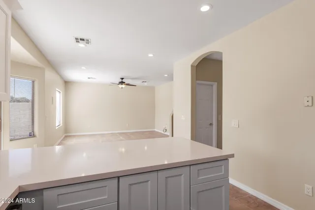 a bathroom with a sink a mirror and a toilet