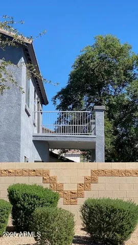 an aerial view of house with swimming pool