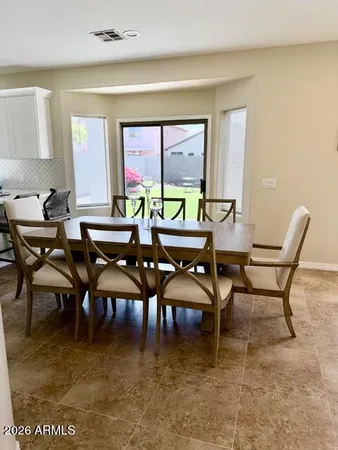a view of a dining room with furniture