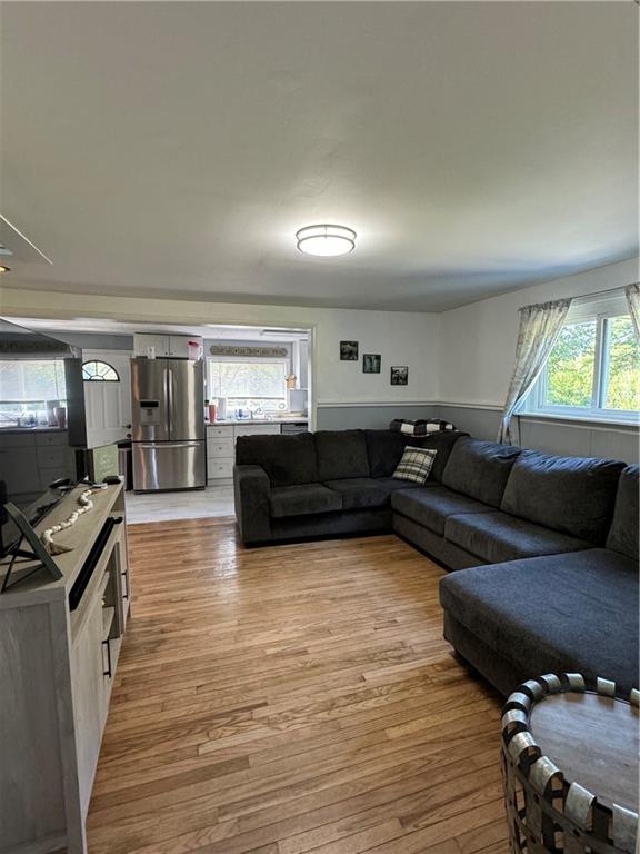 454 Ferguson Road Dunbar, PA 15431 - Photo 15 of 24 a living room with furniture and a wooden floor
