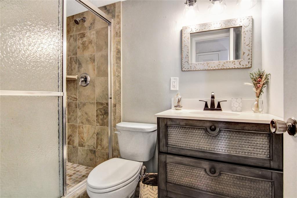 4500 North Federal Highway, Unit 158G Lighthouse Point, FL 33064 - Photo 14 of 36 a bathroom with a sink toilet and shower