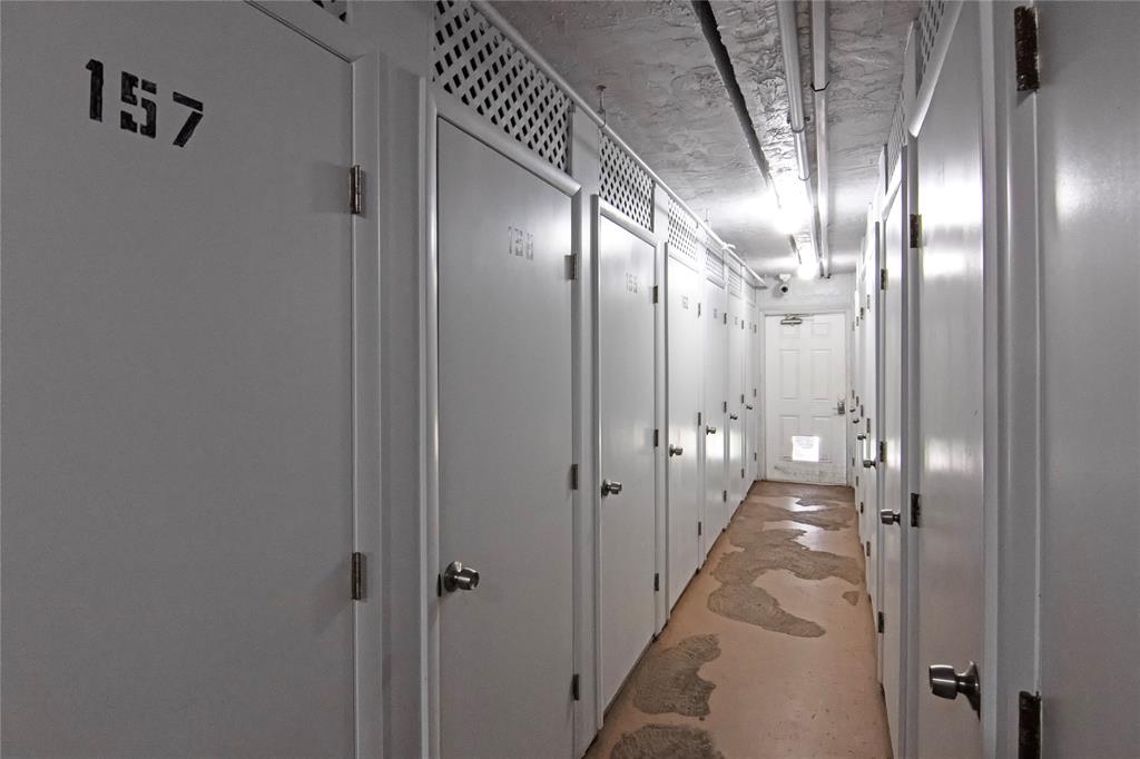 4500 North Federal Highway, Unit 158G Lighthouse Point, FL 33064 - Photo 19 of 36 a view of a hallway with wooden floor