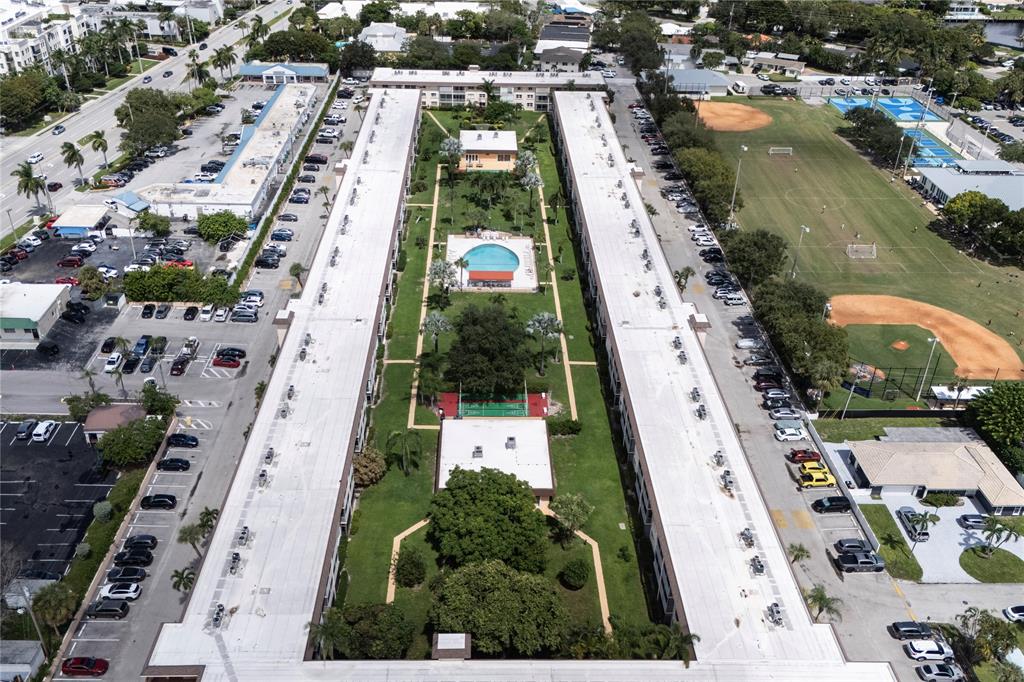 4500 North Federal Highway, Unit 158G Lighthouse Point, FL 33064 - Photo 21 of 36 an aerial view of residential houses with outdoor space