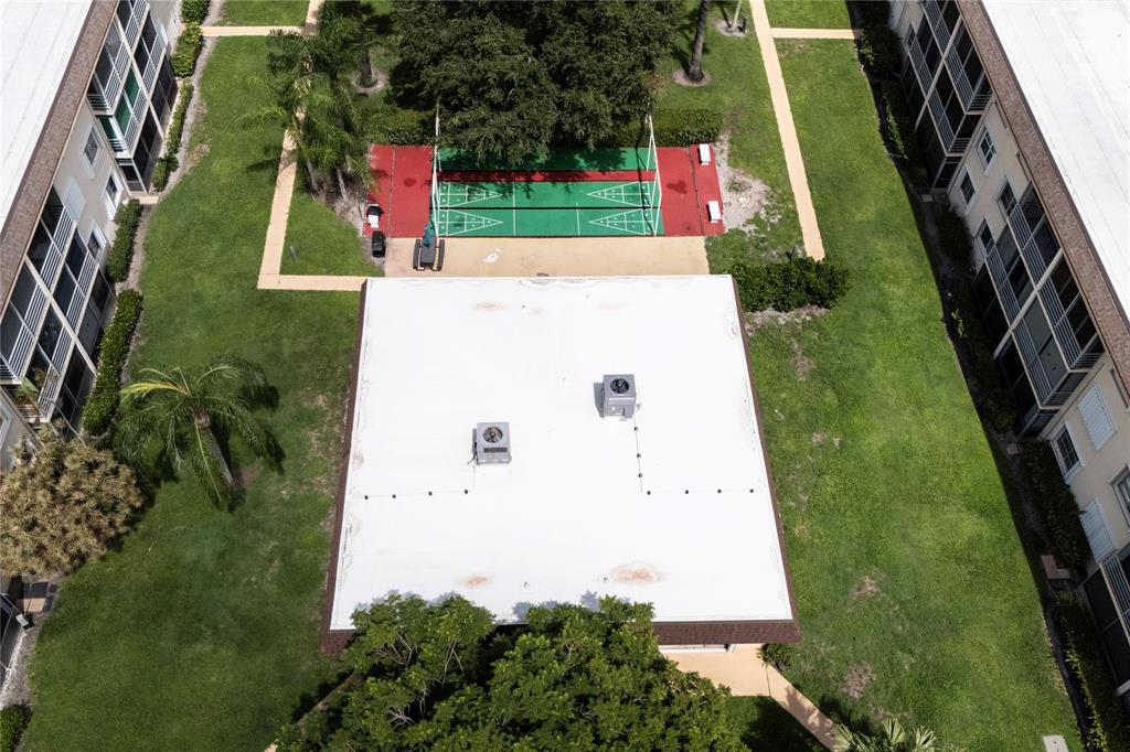 4500 North Federal Highway, Unit 158G Lighthouse Point, FL 33064 - Photo 22 of 36 an aerial view of residential house with outdoor space and swimming pool