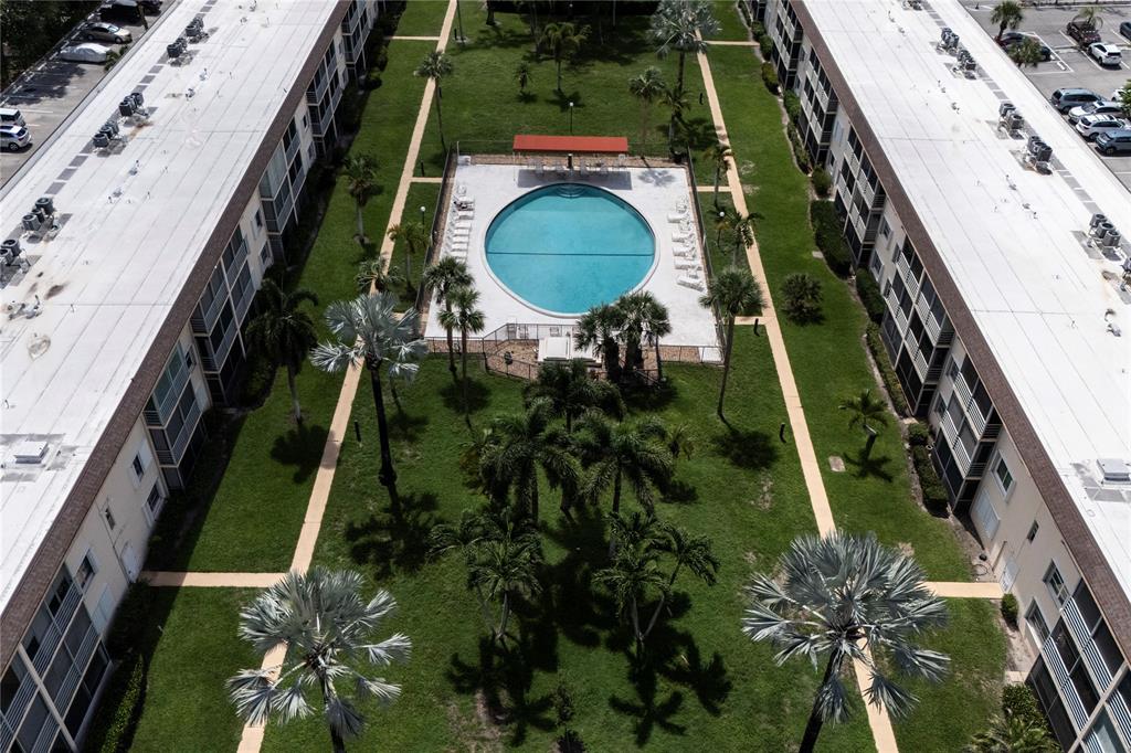 4500 North Federal Highway, Unit 158G Lighthouse Point, FL 33064 - Photo 24 of 36 an aerial view of a house with a garden