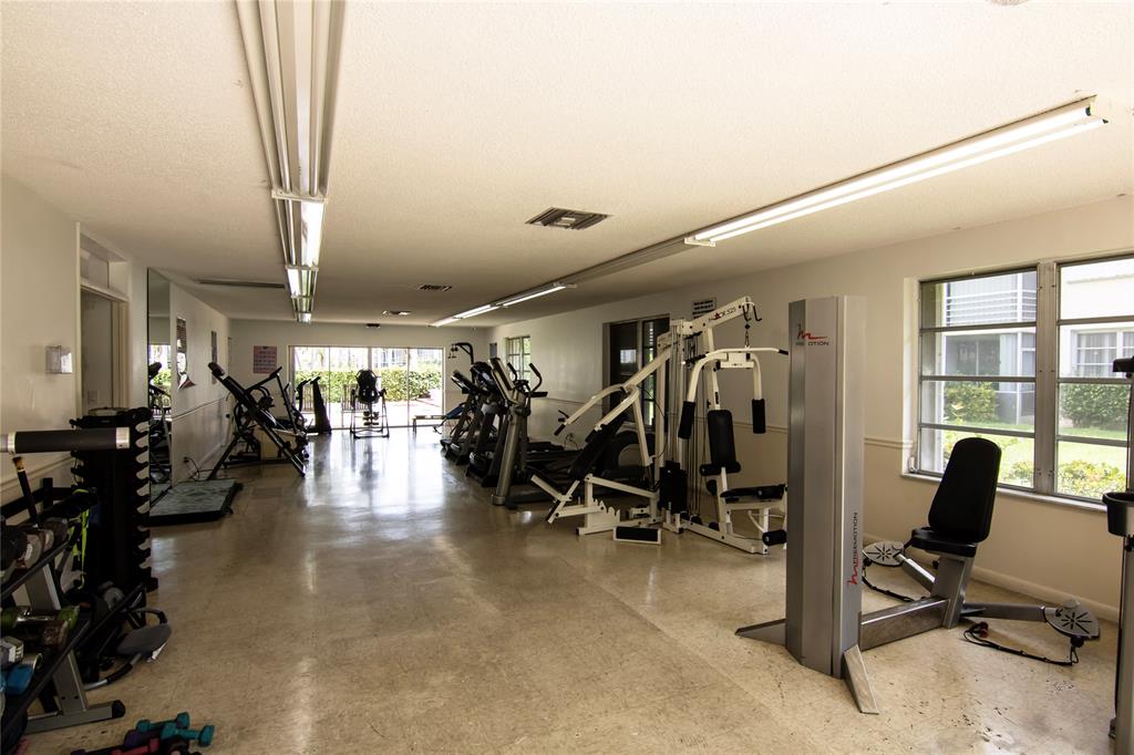 4500 North Federal Highway, Unit 158G Lighthouse Point, FL 33064 - Photo 31 of 36 a view of a room with gym equipment