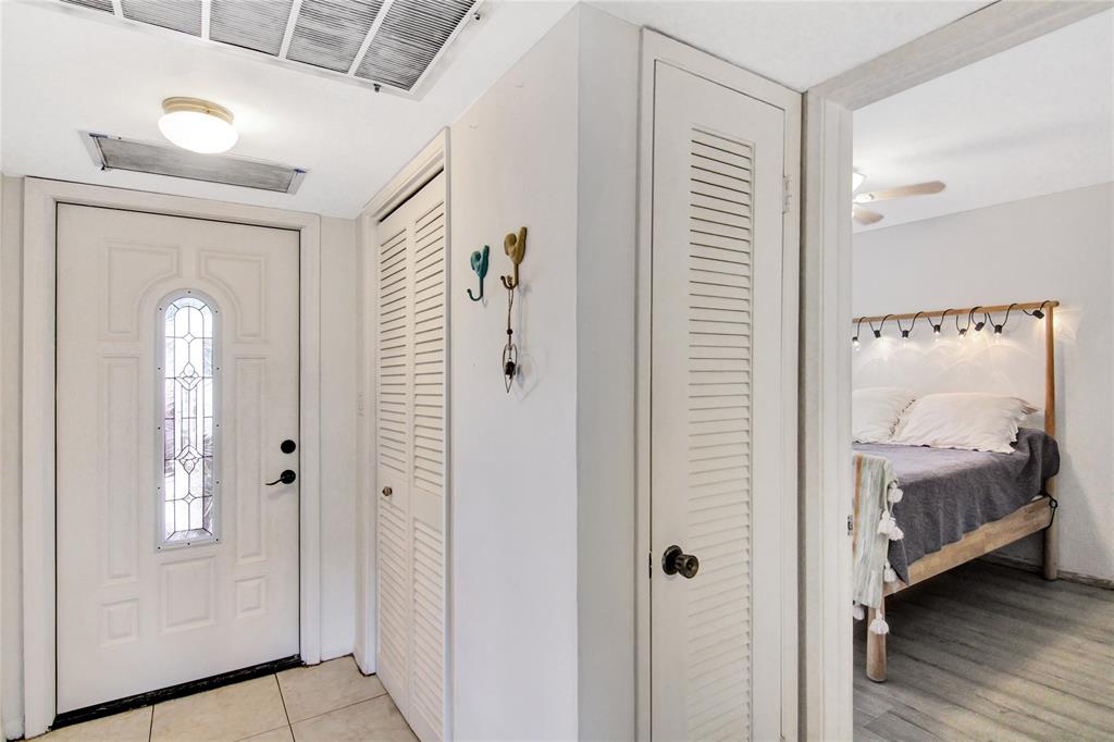 4500 North Federal Highway, Unit 158G Lighthouse Point, FL 33064 - Photo 5 of 36 a view of a bedroom with bed and a window