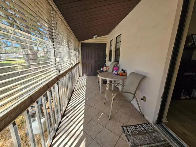 a porch with seating space