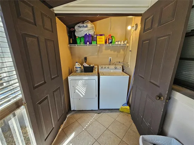 a view of storage and utility room