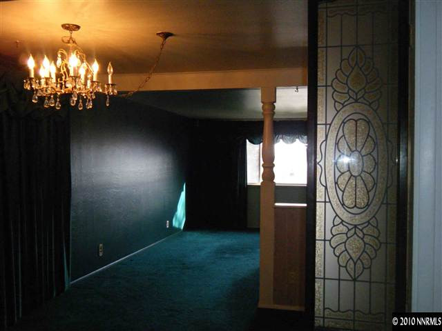 1955 West 6th Street Reno, NV 89503 - Photo 6 of 9 a room with lots of yellow lighting