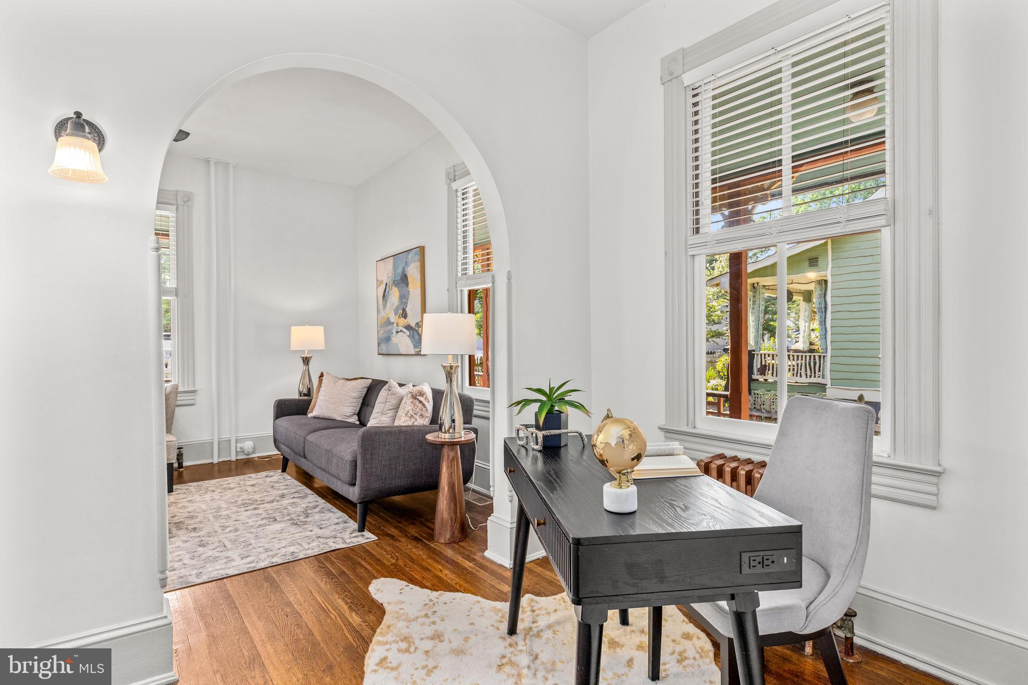 4916 40th Place Hyattsville, MD 20781 - Photo 12 of 48 a living room with furniture and a window