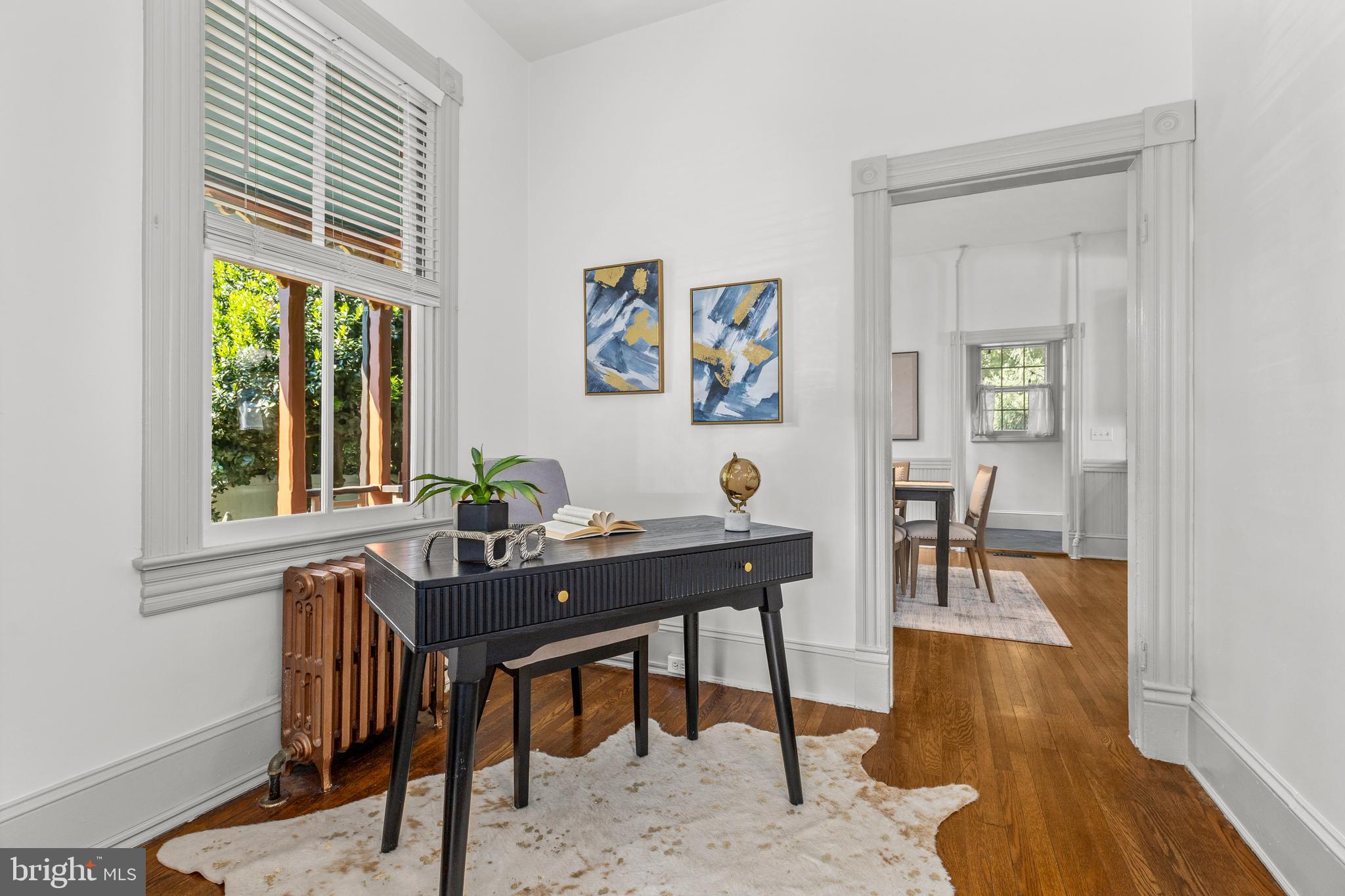 4916 40th Place Hyattsville, MD 20781 - Photo 13 of 48 a view of a dining room with furniture window and outside view