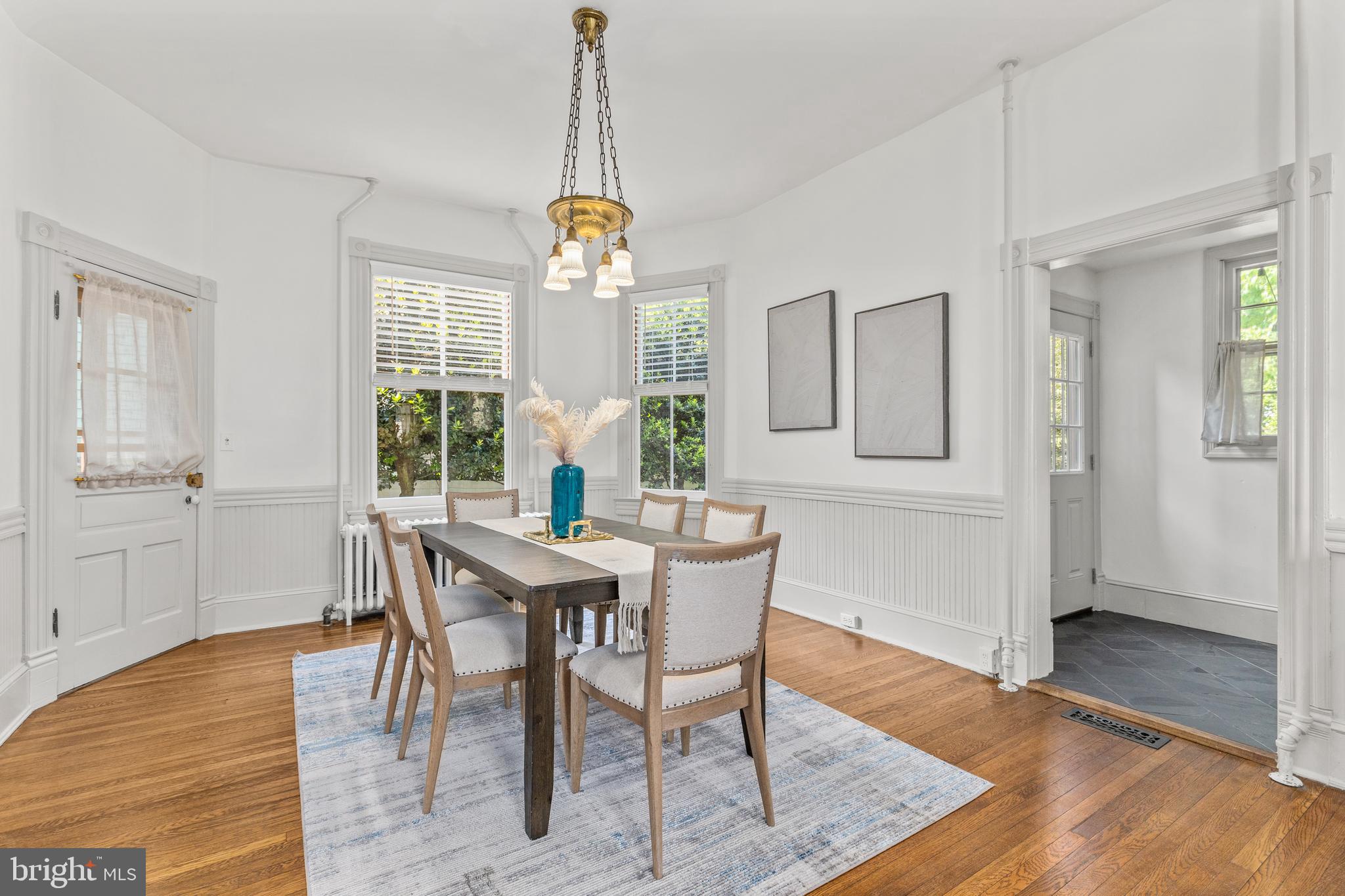 4916 40th Place Hyattsville, MD 20781 - Photo 14 of 48 a view of a dining room with furniture window and wooden floor
